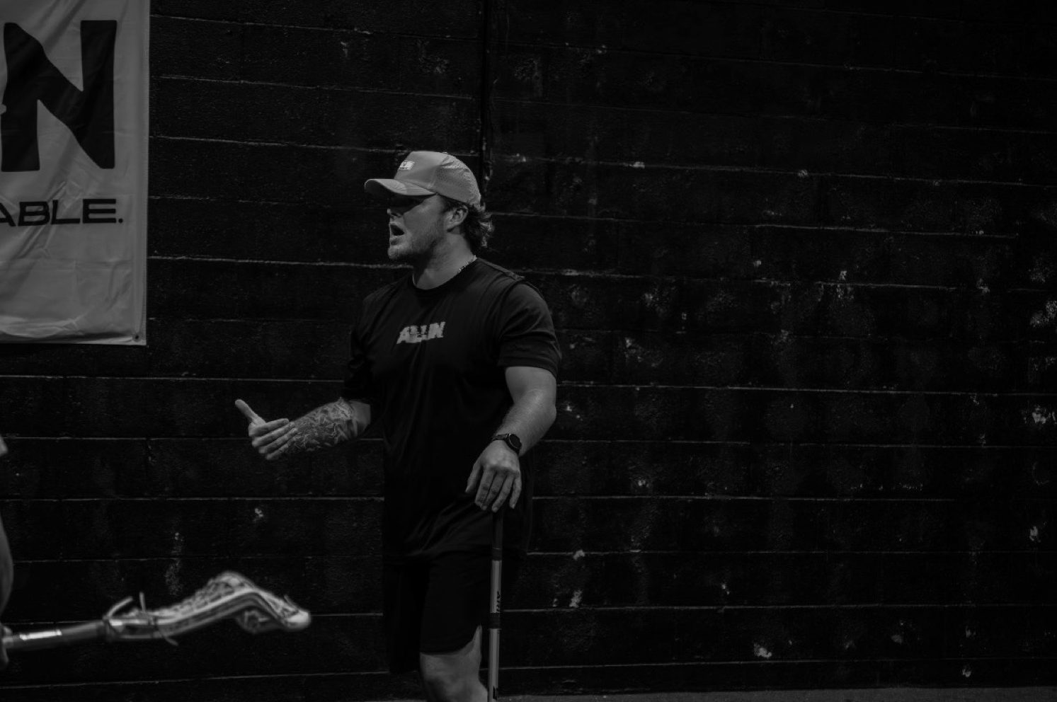 Coach McGinn giving instruction during a session